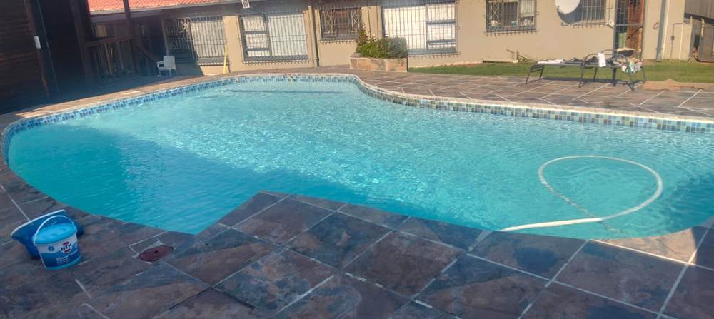 Clean swimming pool at the correct water level in the evening in Johannesburg